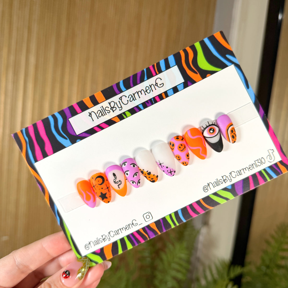 Trippy orange and purple evil eye Acrylic Press on nails
