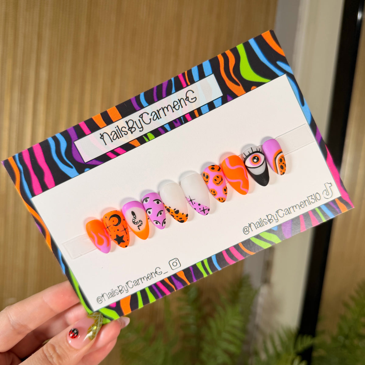 Trippy orange and purple evil eye Acrylic Press on nails